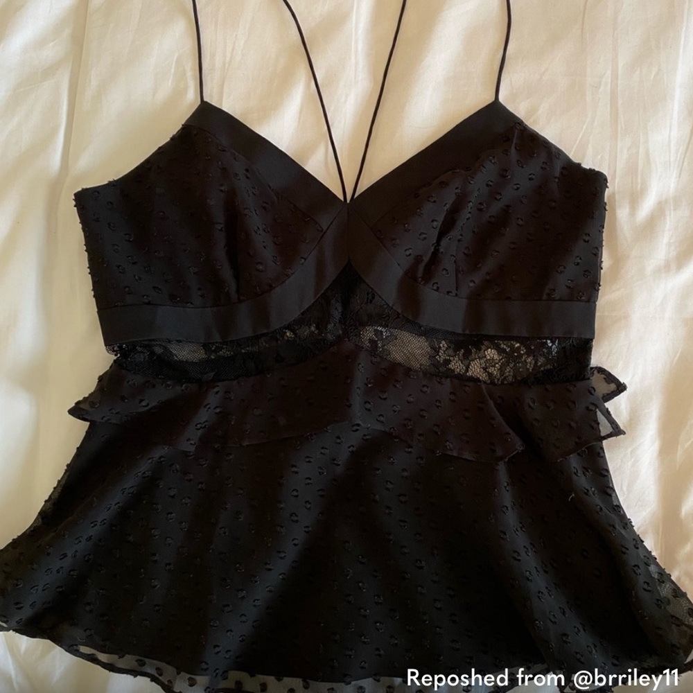 Likely top with lace detailing